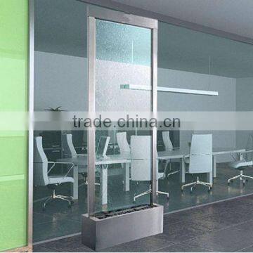 Tranquil indoor waterfall conference room partition