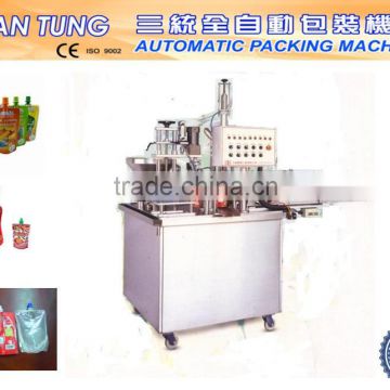 Automatic spout pouch filling and packing machine