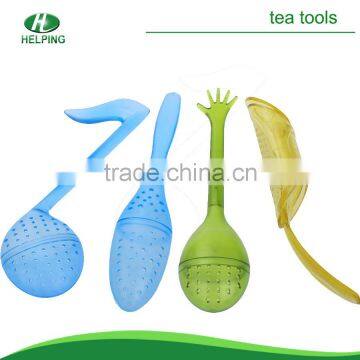 Various color plastic tea strainer.