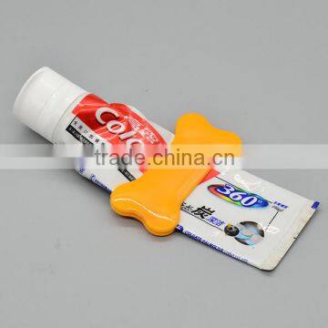 Bone Shape Toothpaste Tube Squeezer for Promotion photo-4