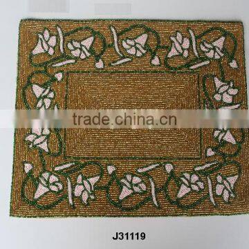 Rectangular Glass bead place mats with patterns in green out line other colours also available