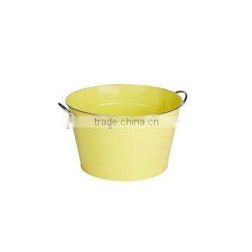 yellow metal tub with handles