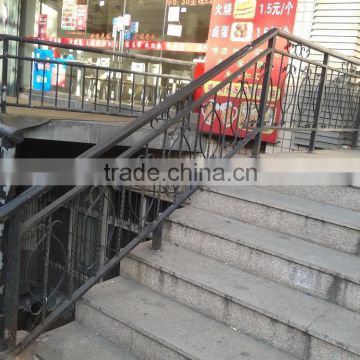 wrought iron stair railing inside and outside