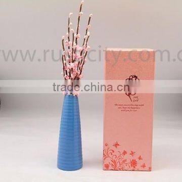 reed diffuser with natural sticks and flowers for gift set