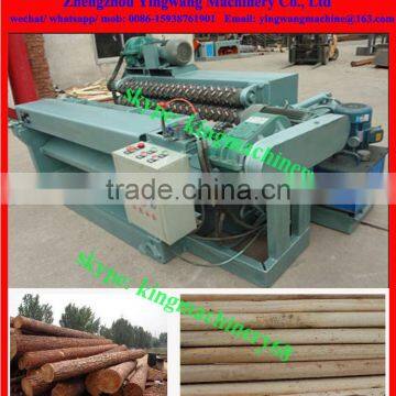 log rounding and debarking machine