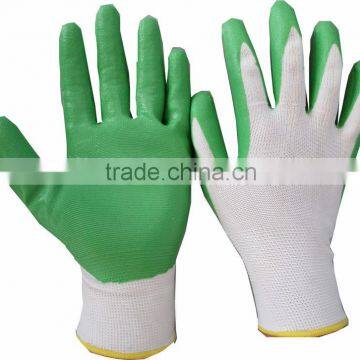 Palm coated green nitrile gloves with white shell