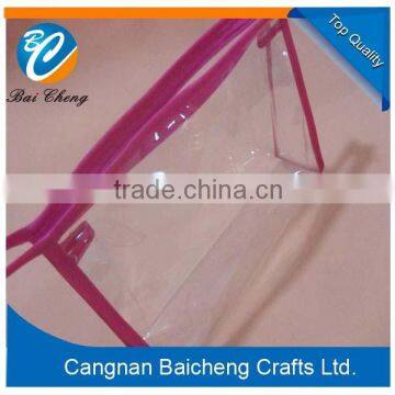easy take soft pvc habdbags for promotions with unique brand sign and names stamped or printed on the clear body