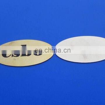 2017 custom oval shape gold debossed metal plate