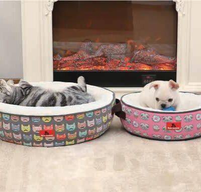 Lit rond en forme de beignet pour chats et chiens avec des anses de panier