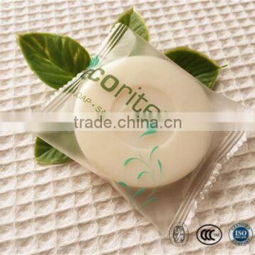 Round hotel mini facial soap 30g with plastic wrapper