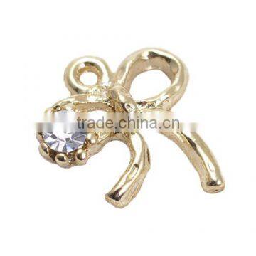 Gold Color Zinc Alloy Bowknot Charm With a Clear Zircon