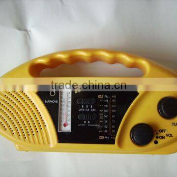solar dynamo radio with LED torch and cell phone charger and thermometer