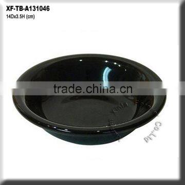 glazed black ceramic fruit dish