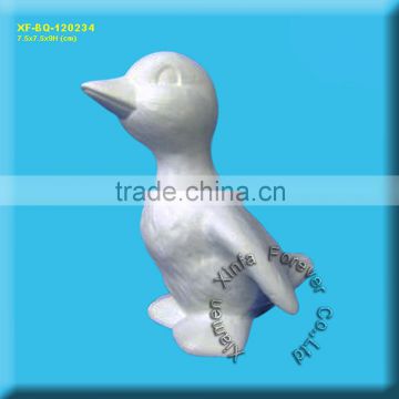 unglazed ceramic duck figurine