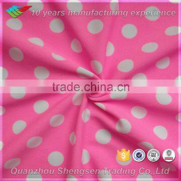 pink fabric with white dot swimwear fabric stock