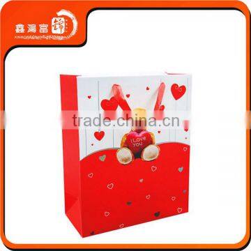 China printed christmas paper packaging bag with your own logo