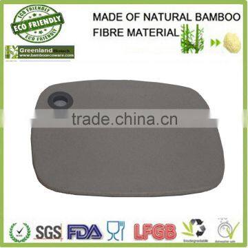 square custom bamboo fibre kitchenware cutting board with hanging hole, bamboo cutting board                        
                                                Quality Choice