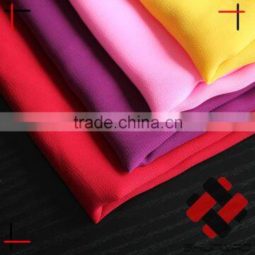 wholesale cheap polyester pearl Chiffon fabric imitated silk for fashion girl dress
