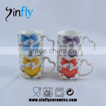 Hot selling heart shape handled ceramic porcelain mug