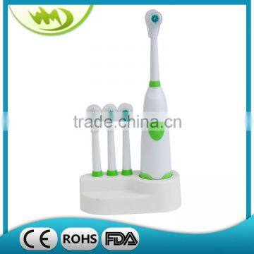 Battery operated adult electric toothbrush with brush head holder