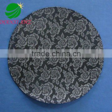 Black round plastic polyester doily