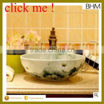 Jingdezhen Factory direct hand curved art bathroom ceramic basin sink