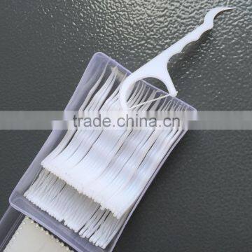 Inter-floss brush dental floss pick in box