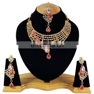 One Sided designer Light Pink Color Stone Gold Plated Kundan Zerconic Necklace Earrings Tikka