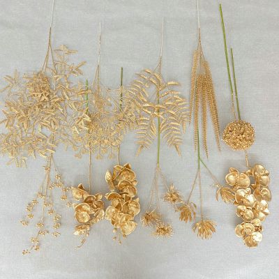 Golden plastic artificial flowers