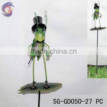 glow in the dark grasshopper decoration on leaf stakes