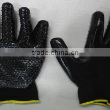 Black polyester knitted gloves with Nitrile coated on palm, pvc dots on one side, 13 gauge