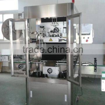 Plastic bottle sleeve labeling machine