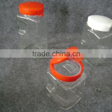 square glass jar with plastic lid