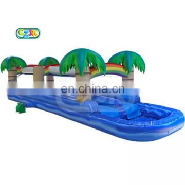 inflatable tree n slip to water slide