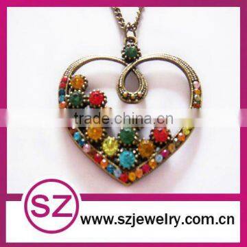 Unique heart with bloom rainbow crystal necklace