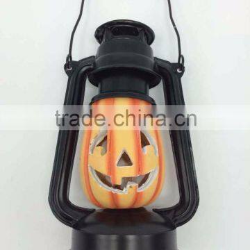 pumpkin looking hurricane lantern for All Saints' Day