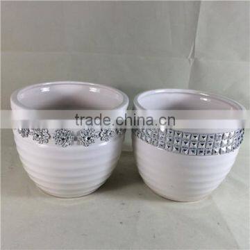 White ceramic flower pot with chain