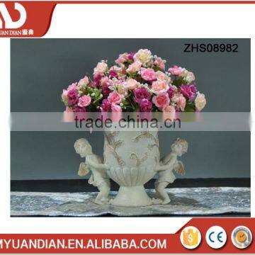 Miniature polyresin flower pot with two cute angel babies for decoration