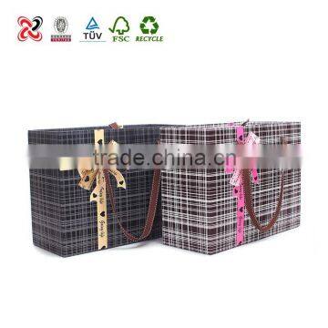 Elegant empty gift boxes with handles