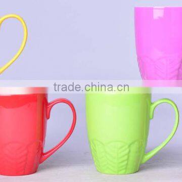 Bright colored Ceramic New bone coffee mug with embossment