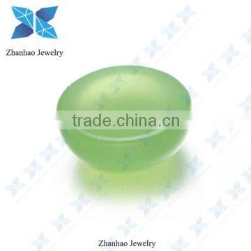 Machine cut synthetic olive green cabochon stone