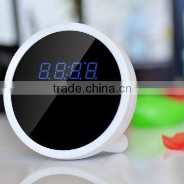 Cute wide angle 720P HD P2P mini wifi clock hidden camera table alarm multifunction support TF card smartphone motion detection