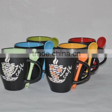 colorful handmade stoneware ceramic mug with spoon