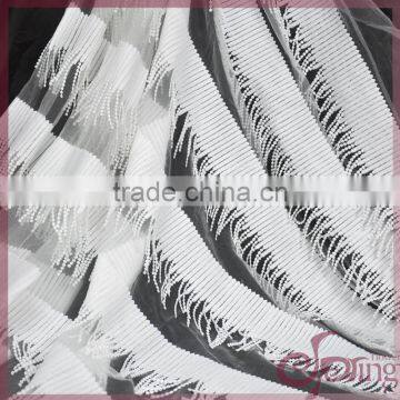 Elegant white embroidery lace mesh fabric with tassel fringe for dress