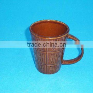 Solid brown color glazed porcelain Nescafe mug