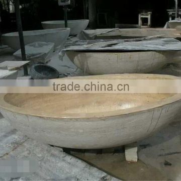 round stone bathtub