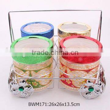 4pcs glass food jar set with colorful decal in a silver rack
