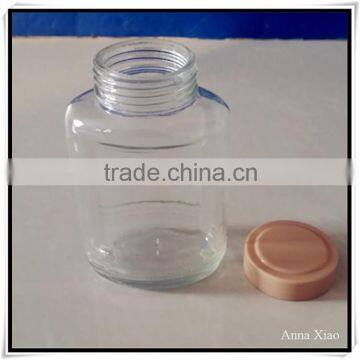 China Made 350ml Glass Honey Jars With Plastic Caps