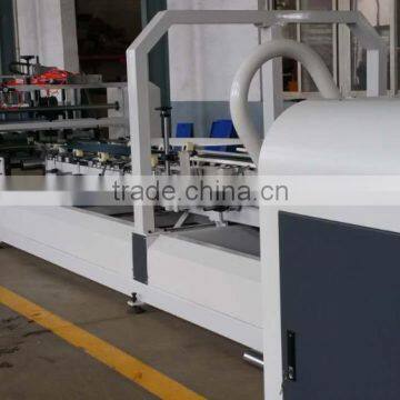 Automatic carton folder and gluer machine