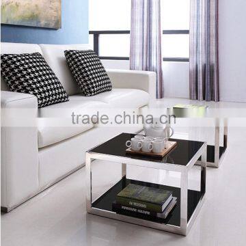 Glass stainless steel centre table